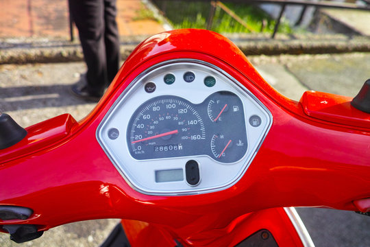 Scooter control panel, signal, fuel and speed indicators.