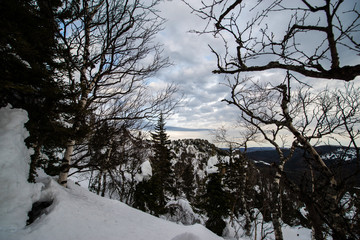 sunset in the mountains of Taganay national Park with easily floating clouds