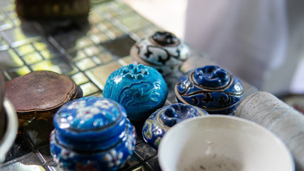 .A collection of vintage asian things. Household items and small vintage statuettes from Asia