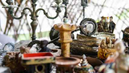 .A collection of vintage asian things. Household items and small vintage statuettes from Asia