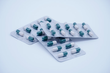 Green-white medical health pill in bright background