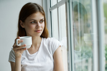 young woman drinking coffee