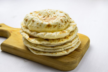 pita breads on a white background