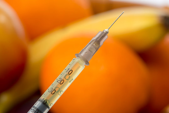 Inyectadora con vitaminas