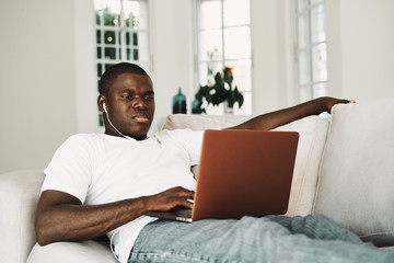 A man of African appearance at home