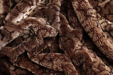 Wool texture for background. Brown wool texture background, brown natural sheep wool, brown fluffy fur texture, close-up macro. Close-up of sheep fur.