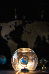 Earth under a glass bell. Quarantine, pandemic concept in the world COVID-19