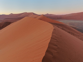 Fototapeta na wymiar Sunrise view from Dune 45 in Sossusvlei area, southern part of the Namib Desert, Namibia