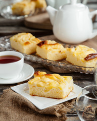 apple pie slice served with black tea