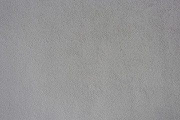 Texture of gray grungy paper. Uneven gray paper