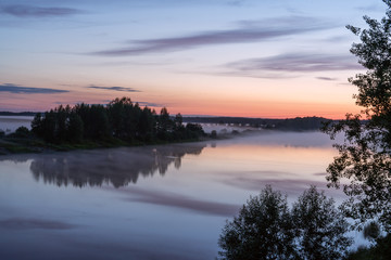 Fototapeta na wymiar Night landscape with foggy river