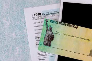 Preparation application form 1040 U.S. individual income tax return of digital tablet notepad stimulus economic tax return check