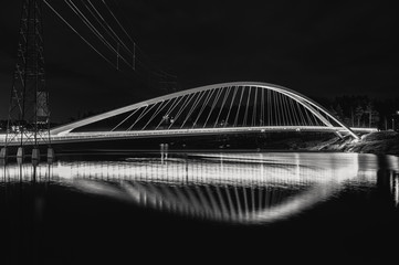 bridge over the river at night.