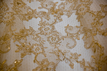 gold on white lace