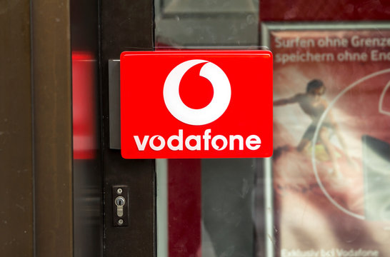 NURNBERG, GERMANY : Logo of Vodafone on door handle of vodafone store - Vodafone is a British multinational telecommunications company