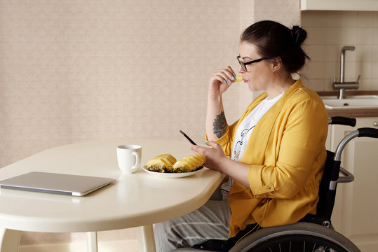 Paralyzed Woman Eating Pineapple