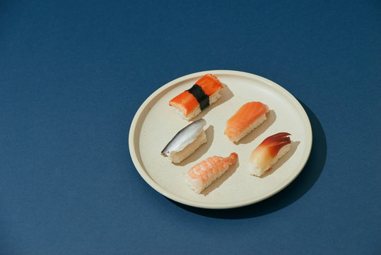 variety of sushi served on a plate