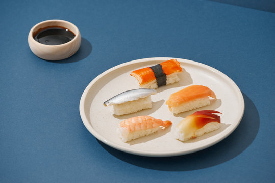 Closeup of rows of healthy freshly prepared sushi rolls