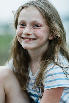 Portrait of Pretty young Redhead girl with Freckles
