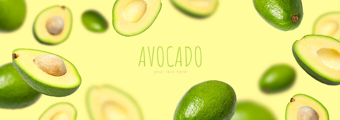 Creative layout with ripe flying avocado halves on yellow background. Healthy food, diet, tropical exotic fruit, trendy food product. Minimalistic summer food concept. Organic avocado. Pop art design
