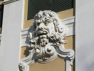 Sculpted face in a Berlin wall