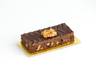 chocolate cake piece with walnut