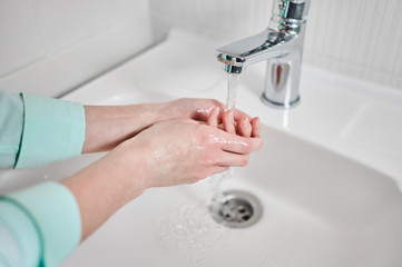 washing hands with soap