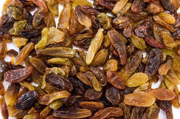 raisins background. Long light raisins on a white.