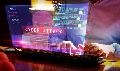 Hacker typing on keyboard with breaking security and code on hologram screen