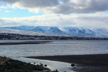 snow-covered majestic mountains near the ocean. The Landscape Of Iceland