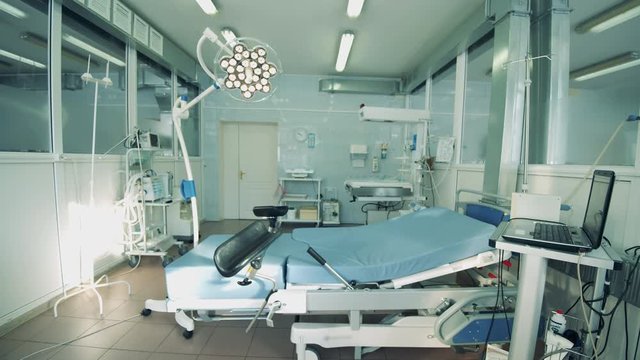 Modern delivery room filled with equipment