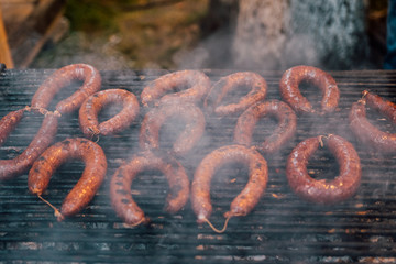 Grilling sausages