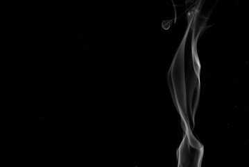 Picture of white cigar smoke in black view