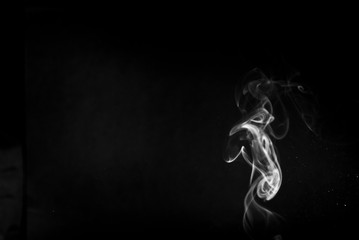 Picture of white cigar smoke in black view