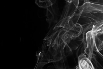 Picture of white cigar smoke in black view