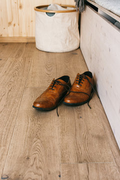 Male Leather Dress Shoes on Wooden Floor