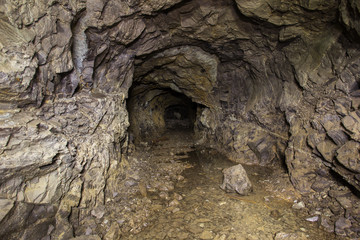 Underground abandoned platinum ore mine tunnel