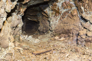 Underground abandoned platinum ore mine tunnel