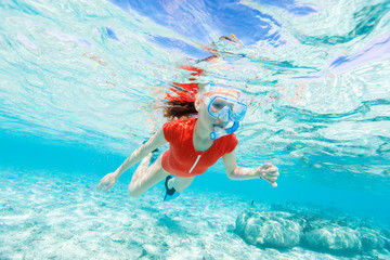Little girl snorkeling