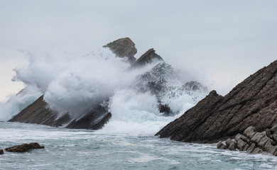 Waves crashing on the rocks