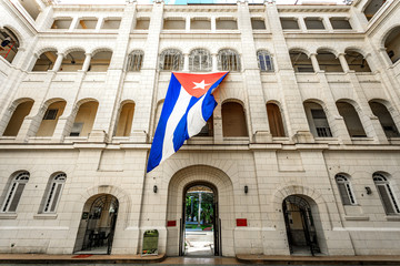 Havana Cuba Cuban flag in the wind.  Museum of revolution.