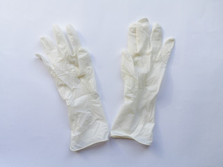 White medical gloves on a white background
