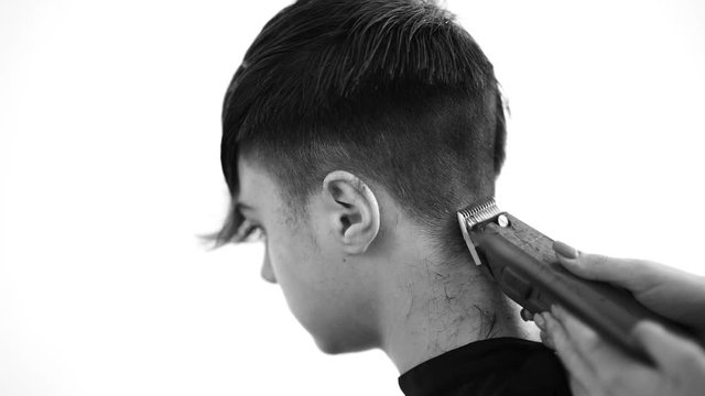 haircut work on young man in black and white