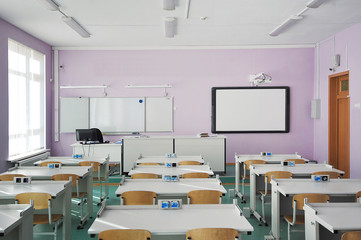 empty classroom at school - all students on distance learning