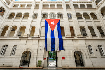 Havana Cuba Cuban flag in the wind.  Museum of revolution.