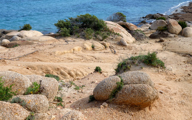 Textured rocks formation on the beach in Villasimius, Sardinia, Italy. Holidays, the best beaches...