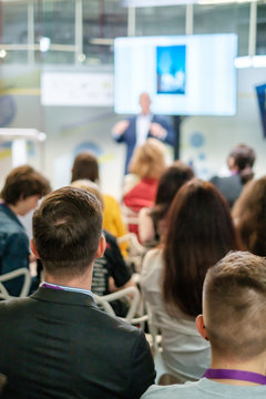 Audience listens lecturer at workshop
