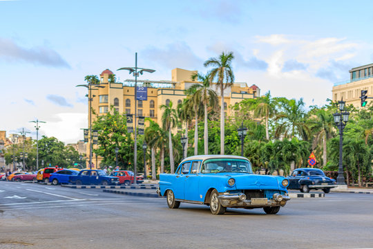 Havana Cuba Bleue vintage classic american car in a typical colorful street with sunny blue sky 
