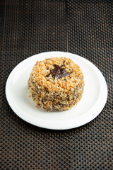 portioned chocolate cake with white cake sprinkles