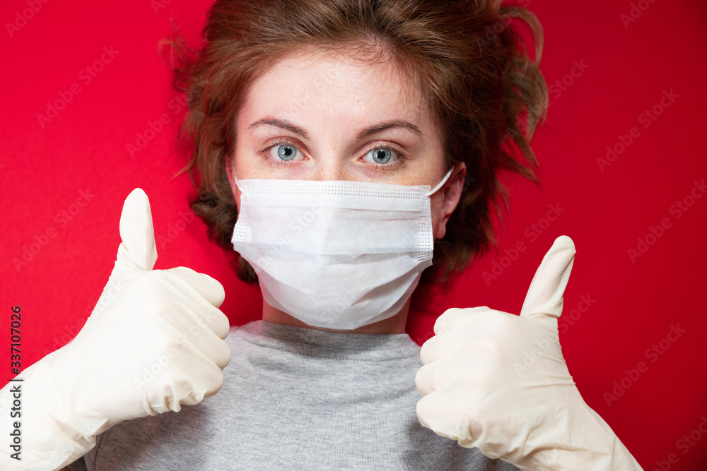 Wall mural stop the virus and epidemic diseases. healthy woman in blue medical protective mask showing gesture 